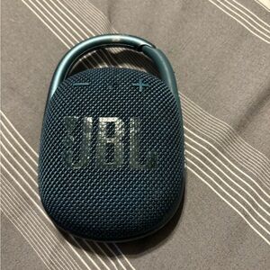 JBL portable wireless clip speaker.   Perfect for golf ir anything outdoors